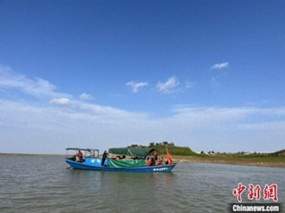 ​鄱阳湖畔访“水中大熊猫”江豚